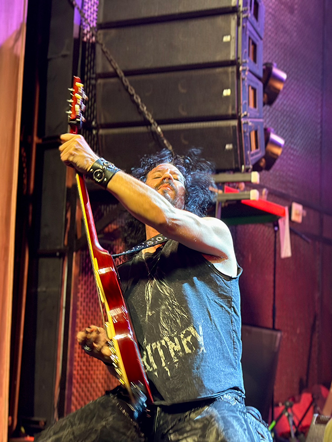 Mike Ruggirello shredding on his Les Paul guitar at the Music Box